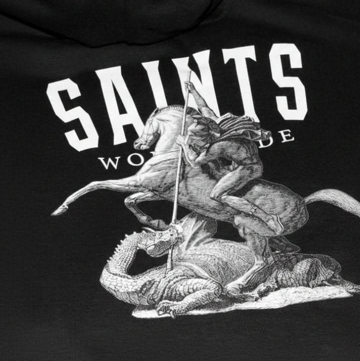 Detailed view of Saints Worldwide hoodie back embroidery of Christian artwork of St George slaying the dragon