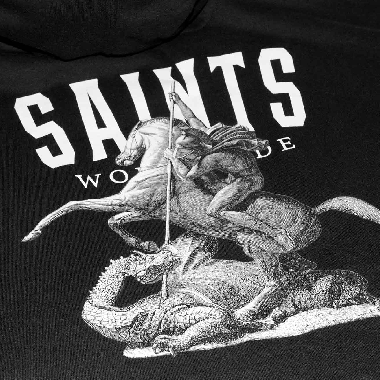 Close-up of the Saint George and the dragon back print on the SAINTS WORLDWIDE black hoodie