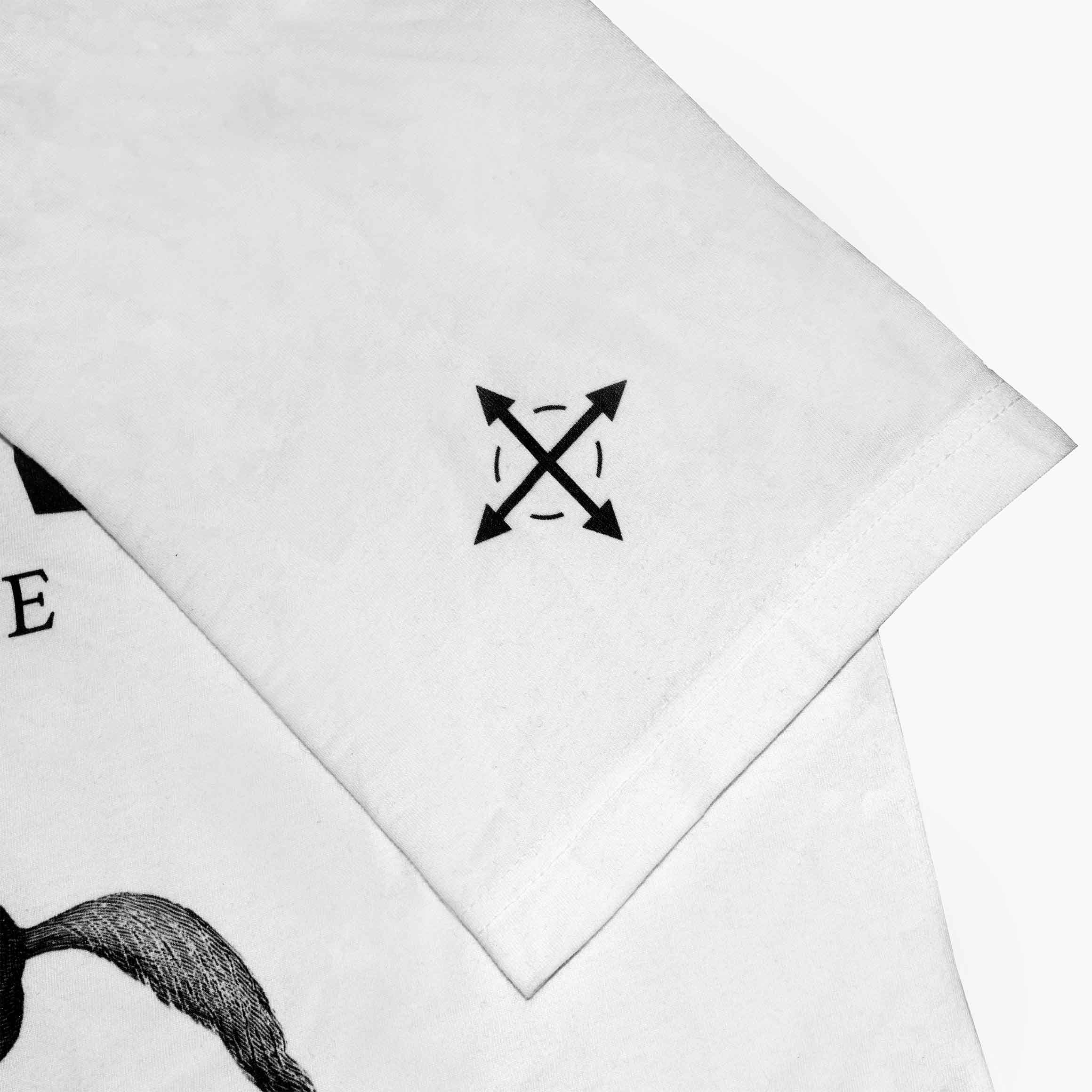 Close-up of a white t-shirt sleeve with a design of plus sign.